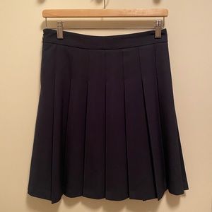 Knee length pleated skirt